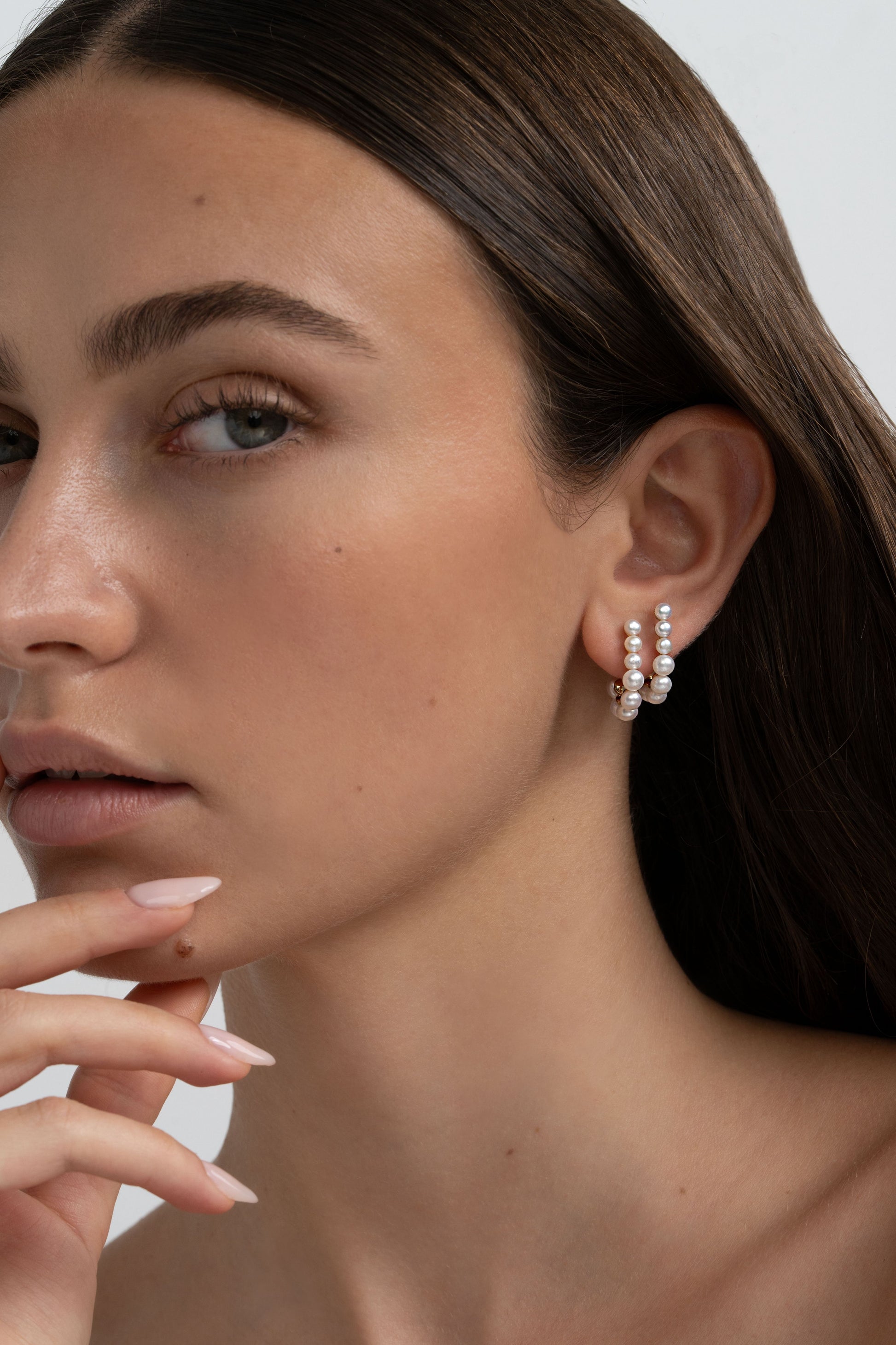 Row of Growing Pearl Bubbles - On Ears