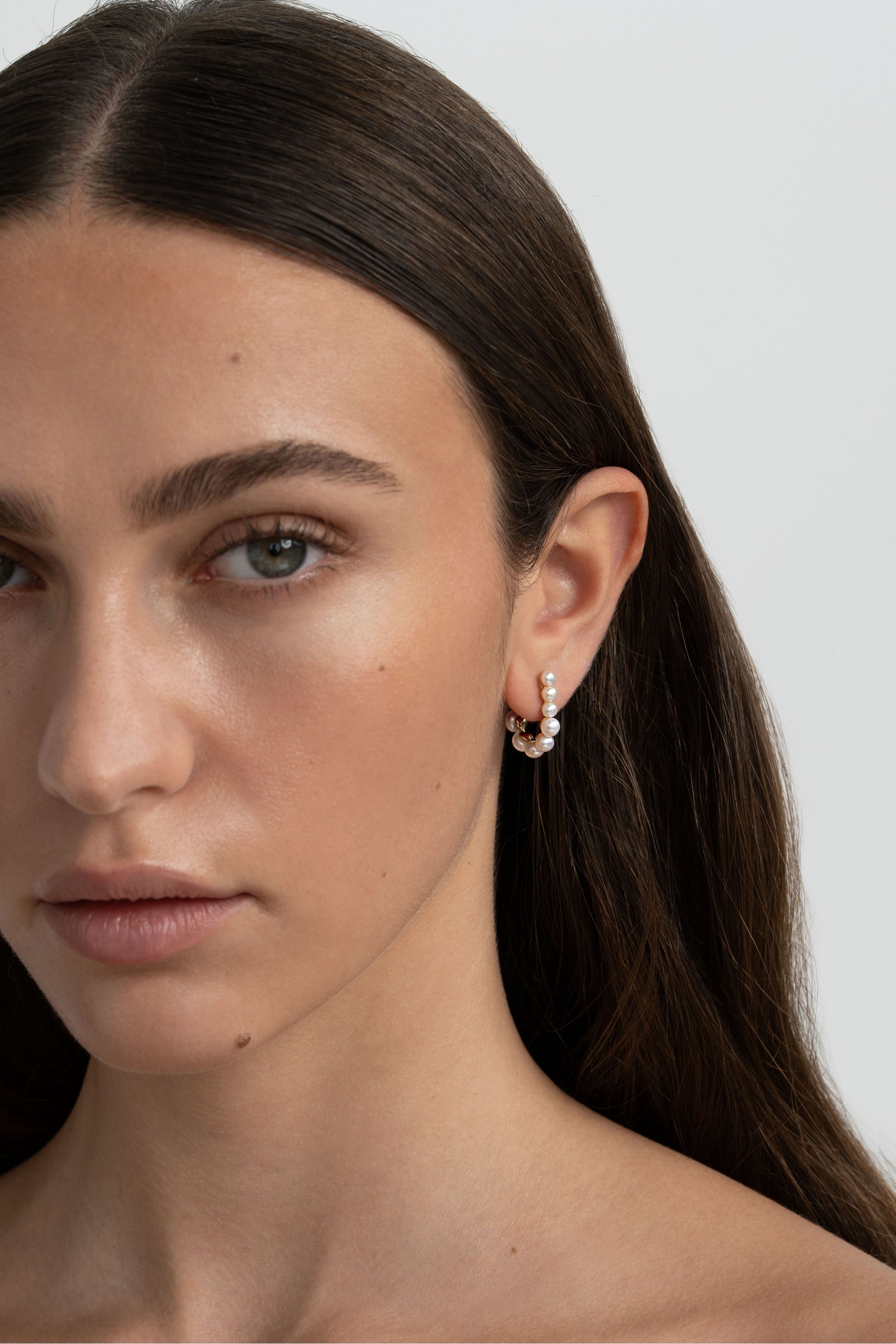 Row of Growing Pearl Bubbles - On Ears